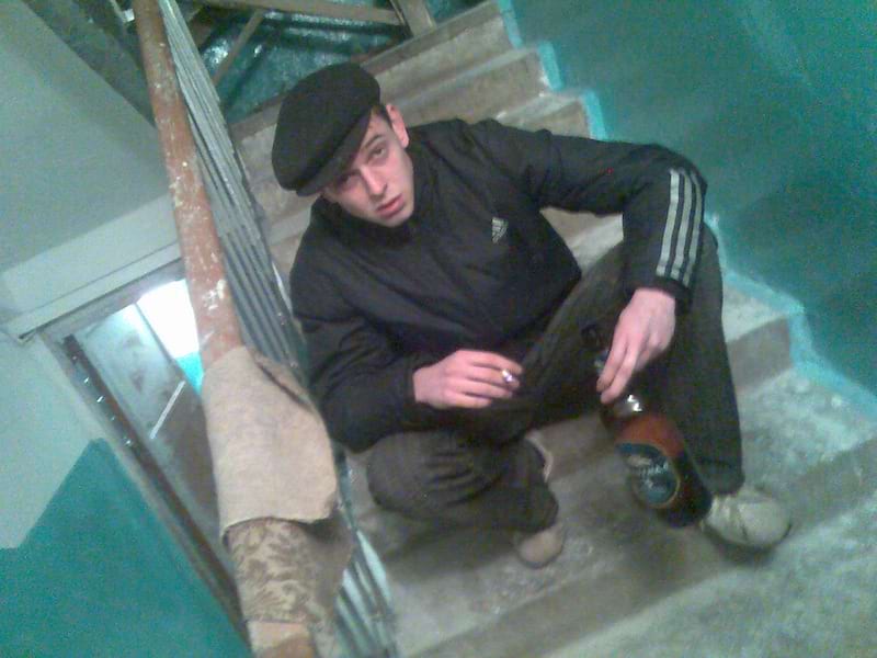 a slav, squatting