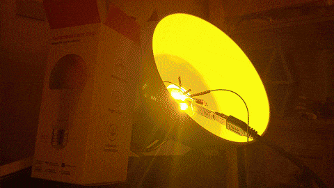 Rainbow color cycle on a dismantled SwitchBot Color Bulb connected to a flasher/debugging probe