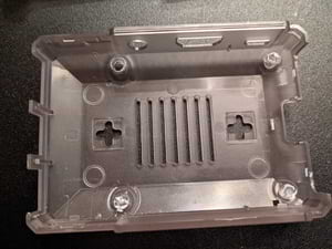 Example shaving of structural plastic on bottom of case