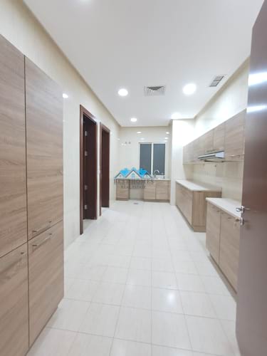 Spacious Four Bedrooms Floor with Balcony in Saqeeq Area