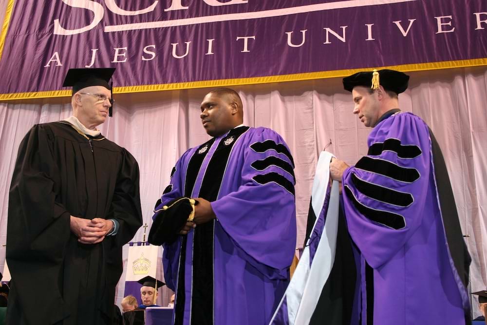 <b>Commencement 2006 honorary degree </b><br /> Father Pilarz presents an honorary degree during the 2006 commencement at The University of Scranton.