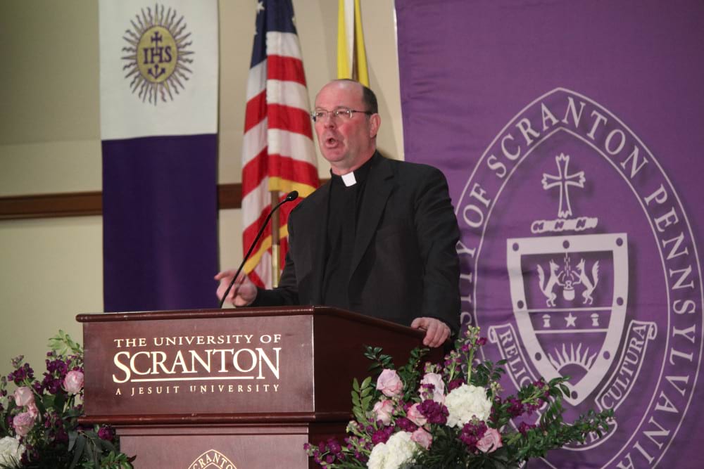<b>Father Pilarz at podium</b><br /> Rev. Scott R. Pilarz, S.J., addresses the crowd during the announcement of his second term as president of The University of Scranton.