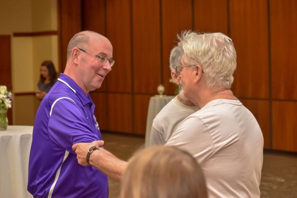<b>Meet and Greet 2018</b><br /> The late Rev. Scott Pilarz, S.J., greets faculty member Stephen Whittaker, Ph.D., during a meet-and-greet event upon Pilarz's return to The University of Scranton for a second term as president.
