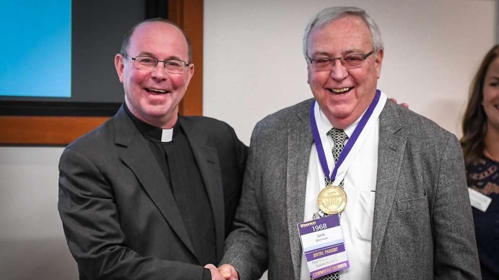 <b>Pilarz and Jack Brennan </b><br /> Father Pilarz presenting John (Jack) Brennan ’68, P’06 with a 50-Year Reunion Medal at Reunion Weekend 2018.