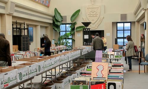 Shown are attendees at the 2019 Friends of the Library book sale. This year's sale includes used non-fiction and fiction hardcover and paperback books, CDs, and DVDs. The sale takes place in the Charles Kratz Scranton Heritage Room on the 5th Floor of the Weinberg Memorial Library, with all proceeds benefiting The Weinberg Memorial Library Endowment.