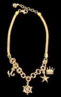 18k gold women’s charm bracelet 6.15 grams
