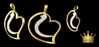 18 karat gold two tone heart ❤️ charm size 1.00 inch weight 2.200