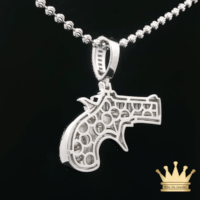 Silver Revolver Pendant with Green Enamel Accents