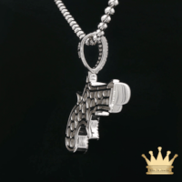 Silver Revolver Pendant with Green Enamel Accents