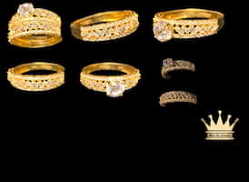 21 k yellow gold female ring set CZ stone size 8.75 weight 7.210 price $900.00