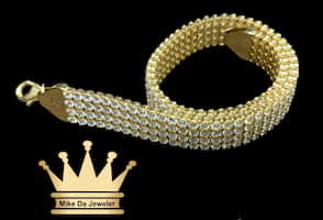 18k tennis bracelet with cubic zirconia stone price $1365 usd weight 12.44 grams 8mm 7.5 inches