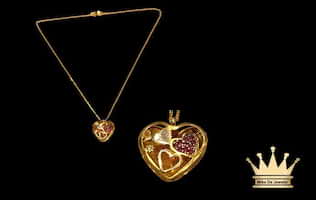 18 karat gold female heart necklace size 16.00 weight 4.120 price $500.00
