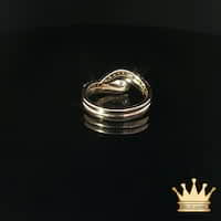 Pear-Shaped Diamond Bypass Engagement Ring and Contoured Diamond Band Set in Yellow Gold
