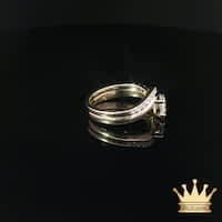 Pear-Shaped Diamond Bypass Engagement Ring and Contoured Diamond Band Set in Yellow Gold