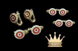 18 k clip earring with color work on it on the circle cubic zirconia price $210 usd weight 1.74 gram
