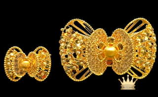 Butterfly style women’s bracelet/ring set 21k 34.01 $3600 price
