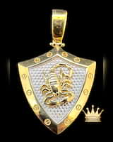 18k gold shield style men’s charm with scorpion grams 7.84 price $910