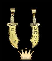 18k handmade yellow gold customized sword pendant with English and Arabic engraved on it price $550 size 1.5 inches