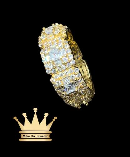 18k yellow gold band with cubic zirconia stone in it price $605 usd weight 5.55 gram size 5.75   8mm all stone prong setting