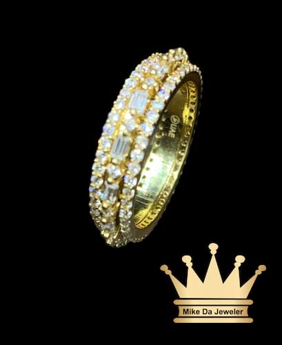 18k yellow gold spinner band with cubic zirconia stone price $680 usd weight 6.2 grams size 8 4 mm