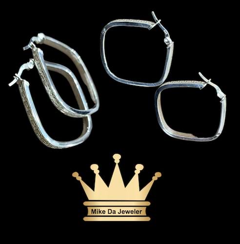 925 sterling silver 3D hoop earring pair v shape with Versace design on it price $165 dollars weight 5.93 grams 1.25 inches 3mm