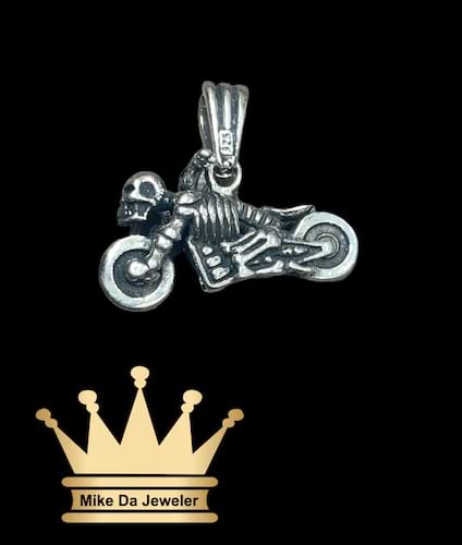 925 sterling silver solid handmade bike pendant with skulls in it price $185  dollars weight 8.95 grams 1 inches