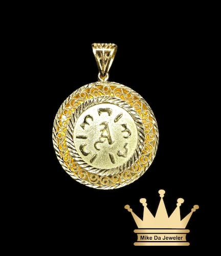 21k handmade customized pendant with initials and Arabic written name on it border diamond cut price $1200 dollars weight 10.5 grams size 1.25 inches