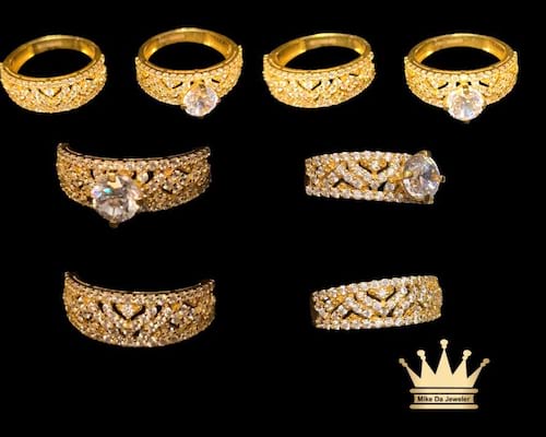 21 k yellow gold female ring set CZ stone size 6.75 weight 7.610 price $950.00