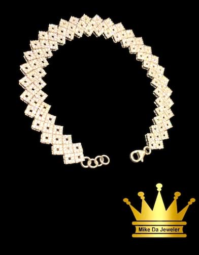 18karat white gold female bracelet cz stone weight 14.210 price $1700.00