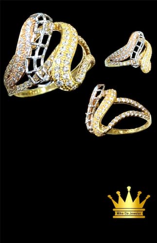 18karat gold female ring three tone white,rose & yellow cz stone weight 2.900 size 7.75 price $400.00