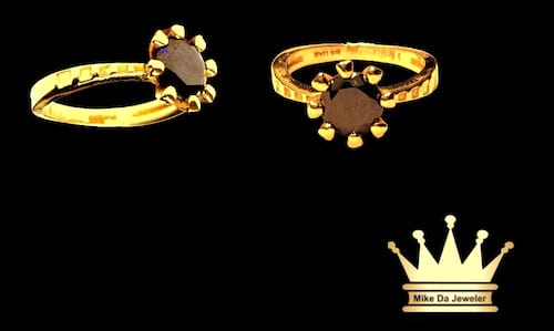 18karat gold female ring size 6.00 weight 3.390 price $400.00