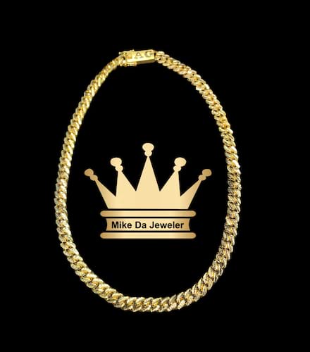 18 k solid handmade customized Miami Cuban link chain one with diamond cut box lock with initials  weight 60 grams 7mm 16 inches