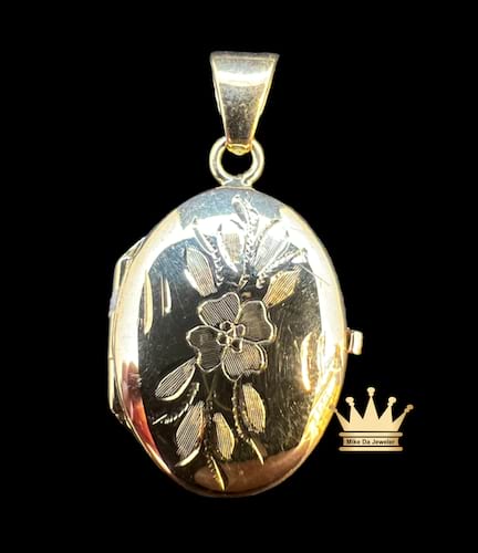 18k yellow gold oval shape locket pendant hand engraved flower/leaf 1 inch grams 4.35  $585