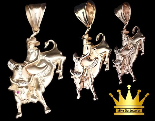 18karat gold bull 🐂 charm size 2.00inch weight 20.490 price $2200.00