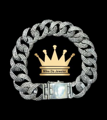 925 sterling silver solid handmade Cuban link bracelet with black color work on it price $750 dollars weight 72.56 grams 9 inches 17 mm