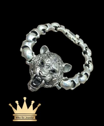 925 sterling silver solid lion face bracelet price $875 dollars weight 86.17 grams 8.5 inches 10mm lion face 1.25 inches