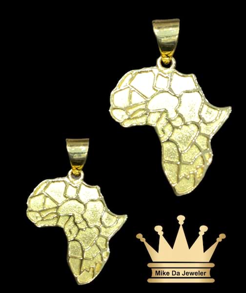 18k Handmade customized Africa pendant    weight 5 grams size 1.25 inches
