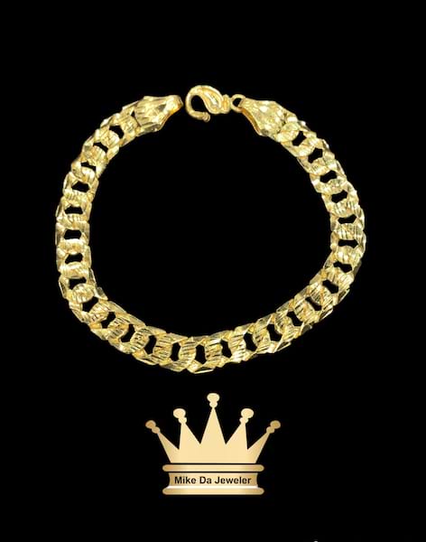 22 k new arrived handmade yellow gold Cuban link with brush work and diamond cut   weight 20.06 grams size 8.75inches