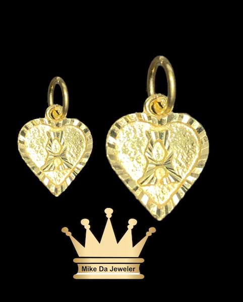 22 k handmade heart with initial  weight 1.74 grams size 0.5 inches