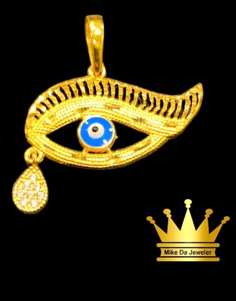 21karat gold evil eye charm weight 2.520  size 0.50 inch