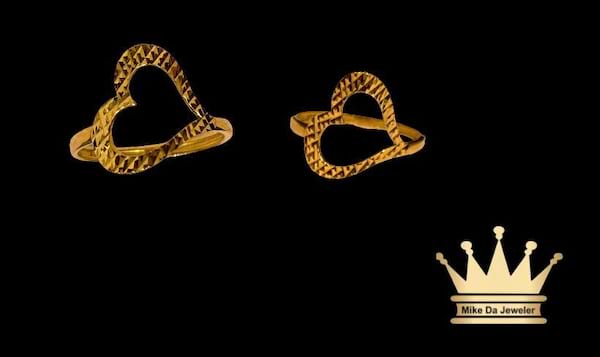 18 karat gold female ring heart size 6.75 weight 1.430