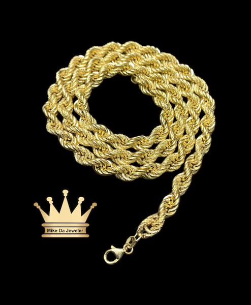 18k light weight rope chain  weight 25.83 grams 26 inches 7mm
