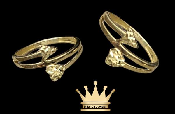 18k handmade female ring with heart  and arrow diamond cut on it    weight 1.3 grams size 5.75 USA