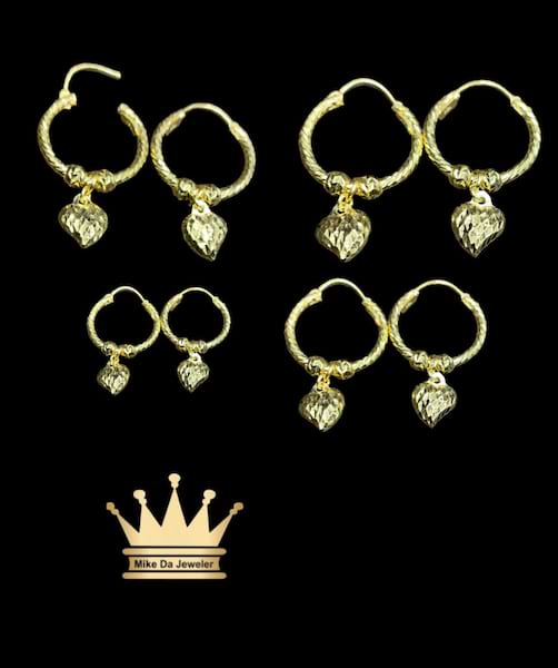 18k hoop earring pair with dangling heart all around dimond Cut  weight 2.68 grams size 0.75 inches