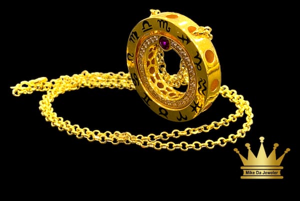 21k chain and charm   weight 12.180mg length 22 inc