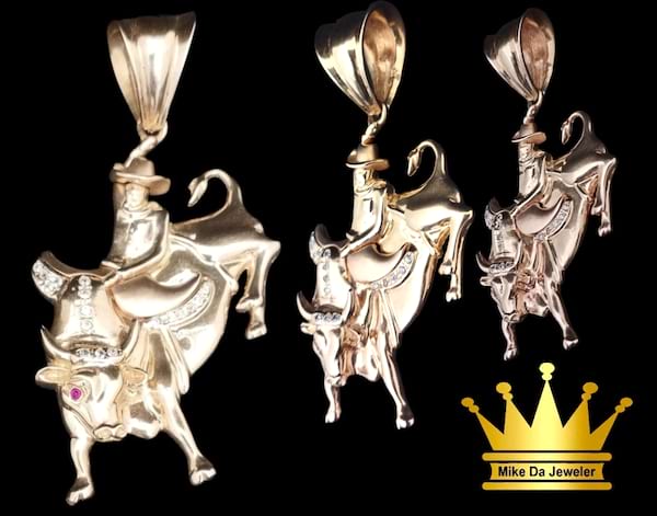 18karat gold bull 🐂 charm size 2.00inch weight 20.490