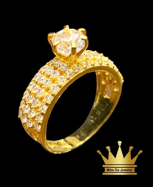 21k gold  solid wedding ring with cubic zirconia grams 5.460  ring us size 8